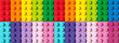 © Tatsiana - Many toy blocks in different colors making up one large square shape in top view. Toys and games. Leisure and recreation.