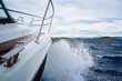 © J.R. PHOTOGRAPHY/Stocksy - Powerboat in rough seas