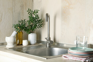 Wall Mural - Kitchen interior with sink and different supplies