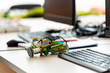 © LIGHTFIELD STUDIOS - Selective focus of robot from building blocks on table near computers in stem school