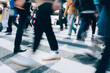 © VISUALSPECTRUM/Stocksy - Blurred Legs of People Crossing Shibuya Crossing in Tokyo