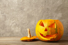 Halloween Pumpkin Head Jack Lantern On Grey Concrete Background