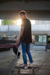 © Demetr White/Stocksy - guy without legs rides a skateboard in a skate park