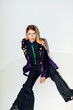 © Katarina Radovic/Stocksy - Female Model Posing in Velvet Blazer