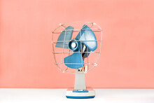 Retro Fan On White Table And Pink Wall