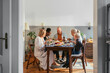 © Studio Firma/Stocksy - Dinner Party