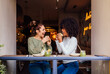 © MyMicrostock/Stocksy - Modern healthy women having lunch in cafe