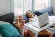 © Tanya Yatsenko/Stocksy - Two girls with a laptop