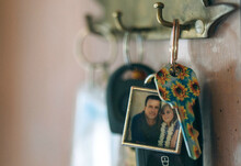 Sunflower Painted Key Hanging On A Key Holder - Photo Of Family On The Key Ring