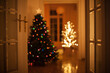 © Mosuno/Stocksy - Christmas Tree in a Living Room