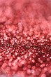 © Pixel Stories/Stocksy - Red glitter with shallow depth of field