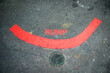 © Tara Romasanta Photography/Stocksy - bump on the ground marked with a red hump and smile