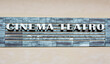 © Beatrix Boros/Stocksy - Cinema and theatre sign in Italian on a wall