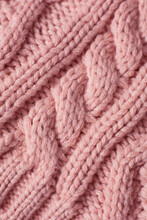 Pastel Pink Knitted Wool Closeup Background
