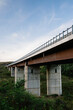 © Beatrix Boros/Stocksy - Bridge captured from below in the countryside