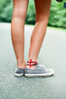 © Marta Locklear/Stocksy - Rear view of teen girl holding a longboard
