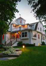 Craftsman Home Exterior At Dusk With Lighting