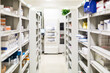 © MaaHoo Studio/Stocksy - Medicines in pharmacy shelves