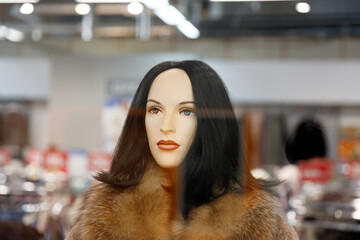 Sticker - beautiful female mannequin in a clothing store