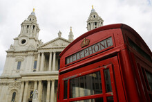The Iconic Red Public Telephone Box Is Seen Backgrounded By The Famous St. Paul's Cathedral In Central London, United Kingdom.