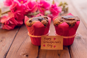 Lovely card with red mallow flowers and two muffins and box and craft tag.