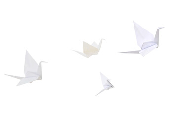 Wall Mural - White origami cranes flying on white