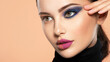 © Valua Vitaly - One half face of a beautiful white woman with  bright makeup and the other is natural. Woman portrait with a deep blue eye makeup of one eye. Natural and  vivid make-up on a female face. Fashion style