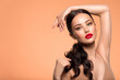 © Valua Vitaly - Beautiful white girl with a red lipstick on lips. Stunning brunette girl with long hair tail.  Closeup face of young beautiful woman with a healthy clean skin. Pretty woman with bright makeup