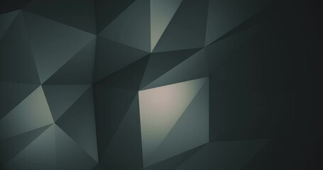 Abstract dark grey green low poly motion background with added blur. Looping, 4K technology background animation.