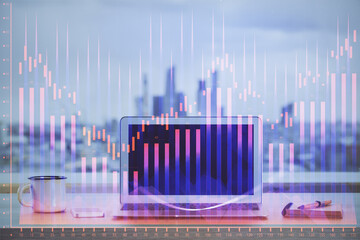 Forex market chart hologram and personal computer background. Multi exposure. Concept of investment.