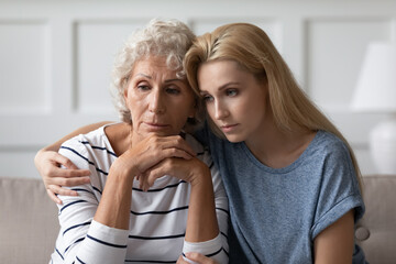 my heart warms to you, dear mommy. sad young adult woman grown up daughter or grandkid sitting on so