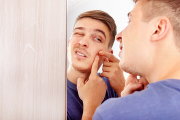 Canvas Print - Young Man with a Pimple