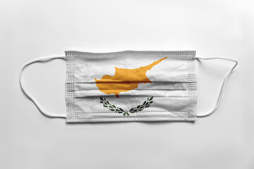 Wall Mural - Face mask with Cyprus flag printed, on white background, isolated