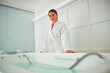 © Yaroslav Astakhov - Beautiful healthy smiling caucasian woman is doing beauty procedures at spa and healthcare salon