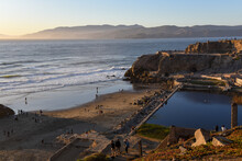 People Are Watching Sunset At The Historical Landmark Sutro Baths In San Francisco On The North Side Of Ocean Beach. And It's The Trail Head Of Lands End.