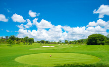 Beautiful Green View At Golf Course ,green Trees And Mountain Blue Sky White Cloud Background