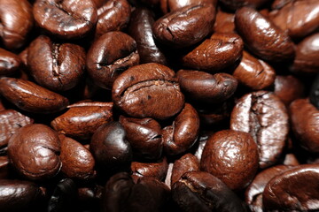 Sticker - close up roast coffee bean background and texture