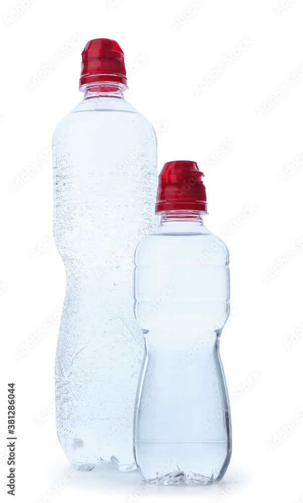 Bottles of clean water on white background