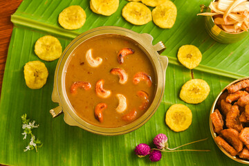 Wall Mural - Onam sadhya sweet parippu payasam or dal kheer dessert Kerala, South India. Indian mithai   Delicious festival sweet dish for Onam, Vishu, Deepawali, sweet food made of condensed milk