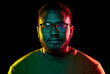 © Syda Productions - people and ethnicity concept - portrait of young african american man in glasses over black background