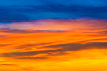 Wall Mural - Sunset dramatic sky with colorful clouds as nature sunset background