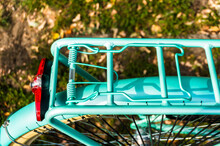 High Angle Shot Of A The Luggage Holder Of A Vintage Blue Bicycle