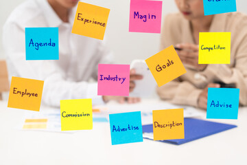 Poster - business people planning startup project placing sticky notes session to share idea on glass wall, Strategy Analysis Office Concept.