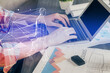 © peshkova - Start up drawings with businessman working on computer on background. Teamwork concept. Double exposure.
