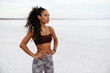 © Drobot Dean - Image of african american sportswoman standing while working out