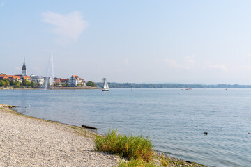 Sticker - rocky beach on Lake Constance with Friedrichshafen and geyser in the background