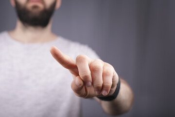 Aufkleber - touching finger press young man
