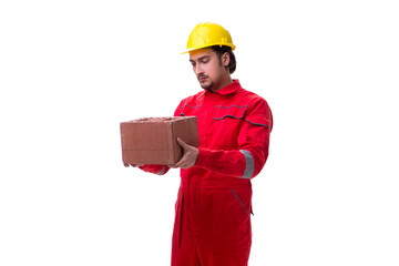 Wall Mural - Young male mason with brick isolated on white