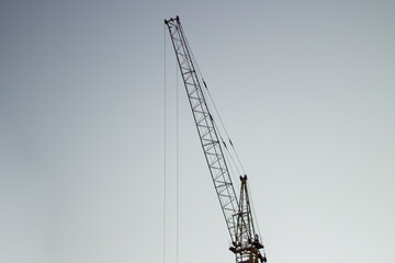 Wall Mural - Tower crane at a construction site. 