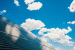 © Inti St. Clair - Solar panels in the desert with blue skies and puffy white clouds